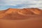 Moroccan desert landscape with blue sky.