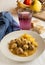 Moroccan kefta tajine meatballs on served on a table.