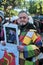 A Moroccan man in the Moroccan Djellaba holds the image of the King of Morocco