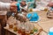 A Moroccan man pours tea into cups. Moroccan mint tea.