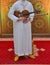 Moroccan musician wearing a Moroccan djellaba plays the violin