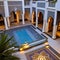 Moroccan Riad: A Moroccan-inspired courtyard with mosaic tiles, lanterns, and a central fountain4, Generative AI