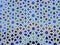 Moroccan style wall with colorful mosaic tiles at the Mohammed V mausoleum in Rabat Morocco