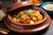 moroccan tagine dish on a wooden surface