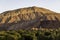 Moroccan village with mountains, river, desert, mountains and lush vegetation near sunrise