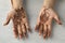 Moroccan woman with henna painted hands