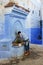 Morocco, Chefchaouen - September 20: A local man washes himself