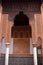 Morocco, Marrakesh. Detail of an arch with symmetrical Islamic - Arabesque style stucco work