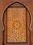 Morocco, Marrakesh. Detail of a medieval painted wooden door panel symmetrical Islamic - Arabesque style