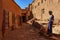 Morocco. The village of Ait Benhaddou. A carpet seller in a alley of the medina