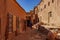 Morocco. The village of Ait Benhaddou. A carpet seller in a alley of the medina