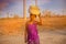 MORONDAVA-MADAGASCAR-OCTOBER-7-2017:The woman in Malagasy life style,she `s usually carrying basket on theirs head in the country