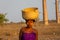 MORONDAVA-MADAGASCAR-OCTOBER-7-2017:The woman in Malagasy life style,she `s usually carrying basket on theirs head in the country