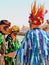 Morris dancers in conversation.