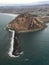 Morro Bay aerial photo at sunset with tall ships entering harbor