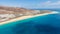 Morro Jable Canary Island, Fuerteventura Spain, Aerial view on coast of atlantic ocean and beach, Drone shot of sea