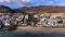 Morro Jable, Fuerteventura, Spain. Breathtaking beach Playa del Matorral in the rays of the sunset. Morro Jable and Playa del