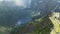 Morskie Oko lake in Tatra Mountains. Flying over the clouds. Lush Scenery