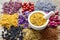 Mortar of dry marigold flowers and herbal tea assortment