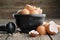 Mortar of eggshell. Shell of eggs on wooden kitchen table