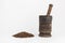 Mortar and pestle with coffee seeds
