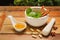 Mortar and pestle with herb and pills