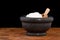 Mortar and pestle with salt