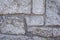 Mortared rough bricks in waterfront wall