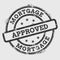 Mortgage approved rubber stamp isolated on white.