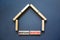 Mortgage investors symbol. Concept words `Mortgage investors` on wooden blocks near miniature wooden house. Beautiful grey