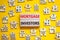 Mortgage investors symbol. Concept words `Mortgage investors` on wooden blocks near miniature wooden houses. Beautiful yellow