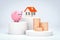Mortgage loan symbol - pink piggy bank, new home and pile gold coins