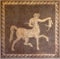 Mosaic of centaur and rabbit on wall in the Archaeological museum of Rhodes Greece.