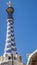 Mosaic tower of Park Guell in Barcelona