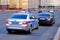 Moscow - 17 April 2021: Police road patrol car with flashing police lights  in pursuit of an intruder`s car