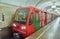 MOSCOW, AUG, 22, 2017: Modern subway passenger red train at metro station. Perspective front view of train cabin. Metro train with