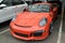 Moscow. Autumn 2018. Orange Porsche 911 GT3 RS On the parking, Racing supercar front view. Transport mode