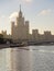 Moscow city center highrise tower on the sunrise and yacht in th