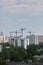 Moscow cityscape view with tower cranes at the background