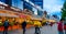 Moscow - July 20, 2019: People Walk on New Arbat Avenue in evening twilight.