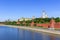 Moscow Kremlin and Kremlevskaya embankment on a blue sky background in sunny summer morning