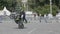 MOSCOW - MAY 15, 2018: Stunt rider making wheelie while rides on the rear wheel on May 15, 2018 in Moscow, Russia