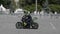 MOSCOW - MAY 15, 2018: Stunt rider making wheelie while rides on the rear wheel on May 15, 2018 in Moscow, Russia