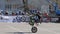 MOSCOW - MAY 15, 2018: Stunt rider making wheelie while rides on the rear wheel on May 15, 2018 in Moscow, Russia