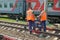 MOSCOW, MAY, 18, 2018: View of railway maintenance workes group with trolley doing rail tracks ultrasonic inspection and visual co