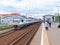 MOSCOW, MAY, 31, 2018: View on city passenger train coming to railway station with waiting people. Russian railways electric passe