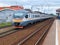 MOSCOW, MAY, 31, 2018: View on city passenger train coming to railway station with waiting people. Russian railways electric passe