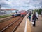 MOSCOW, MAY, 31, 2018: View on city passenger train coming to railway station with waiting people. Russian railways electric train