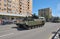 MOSCOW, MAY, 9, 2018: Great Victory holiday parade of Russian military vehicles. Celebrating people, Victory symbols in the backgr