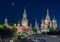 Moscow night cityscape with Cathedral of Vasily the Blessed Saint Basil`s Cathedral and Spasskaya Tower of Moscow Kremlin on Re